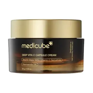 קרם קפסולות ויטמין C Medicube - ערכת קפסולות כחולה עם קרם ויטמין C, קפסולות שקופות וסמלי אנטי-אייג'ינג