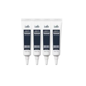 Lador Keratin Power Glue - 4 אמפולות שקופות עם דבק קרטין, מברשת שיער וסמלי אחיזה על רקע מקצועי
