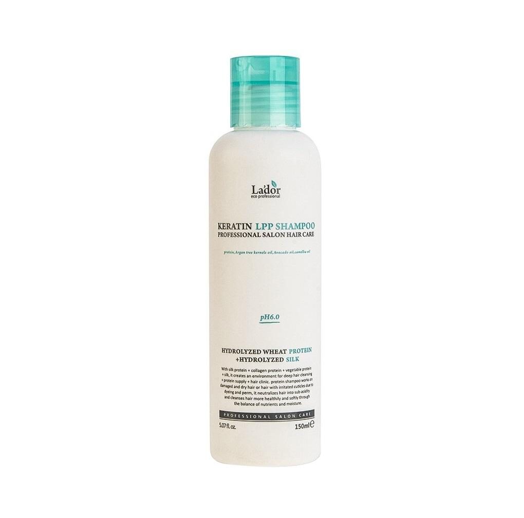 שמפו קרטין Lador 150 מ"ל - בקבוק סגול קטן עם פקק, נוזל שמפו מוזהב על רקע אלגנטי